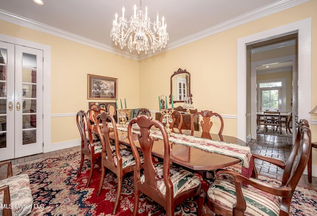 dining space featuring recessed lighting, a chandelier, baseboards, ornamental molding, and french doors