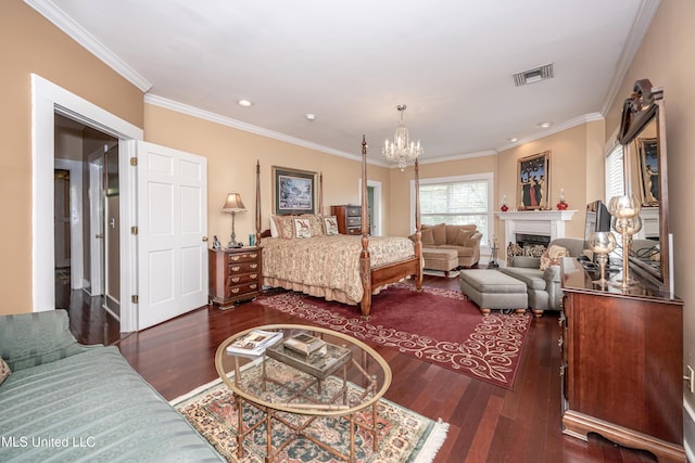 bedroom with recessed lighting, wood finished floors, ornamental molding, visible vents, and a notable chandelier