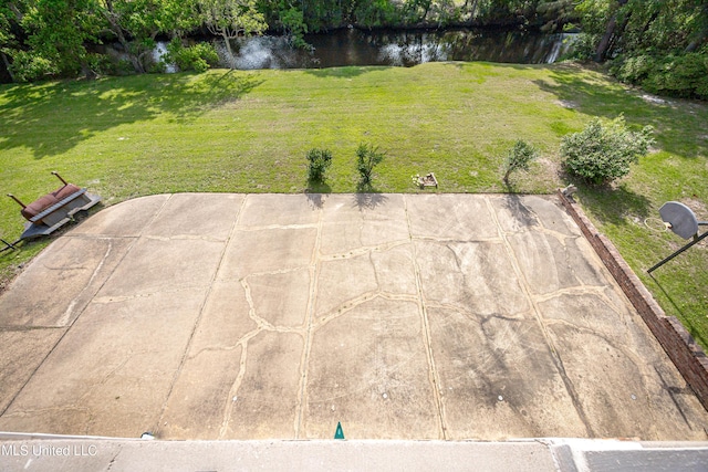 view of yard with a water view