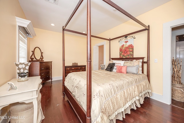 bedroom featuring recessed lighting, wood finished floors, and baseboards