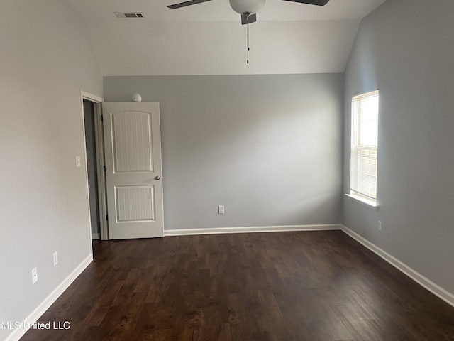 9078 Mallard Park Blvd, Walls, MS 38680 - spare room with vaulted ceiling, ceiling fan, dark wood-type flooring, and baseboards