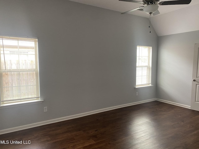 9078 Mallard Park Blvd, Walls, MS 38680 - spare room with ceiling fan, healthy amount of natural light, lofted ceiling, dark wood-style flooring, and baseboards