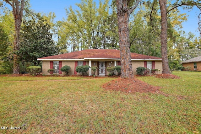 ranch-style house with a front lawn