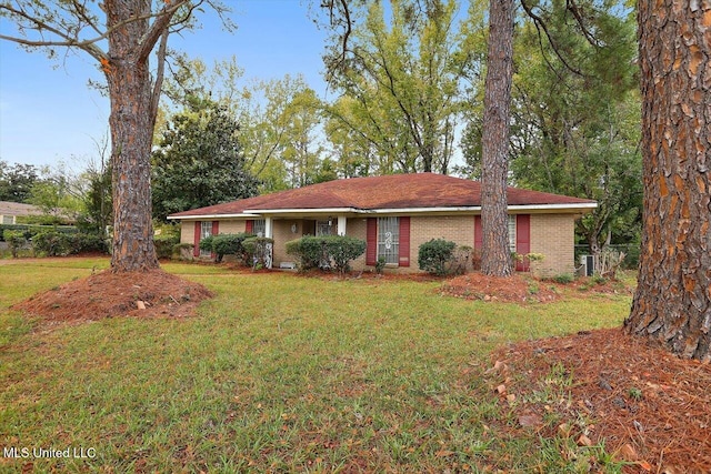 ranch-style house with a front lawn