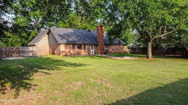 118 Dogwood Trl, Brandon, MS 39047 - view of front of property with brick siding and a chimney