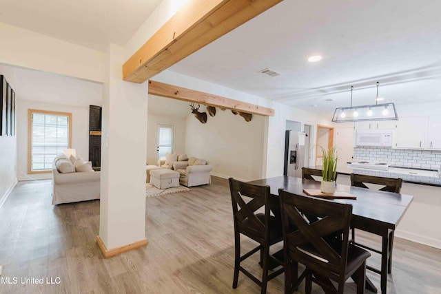 118 Dogwood Trl, Brandon, MS 39047 - dining area featuring light wood-style flooring, plenty of natural light, baseboards, and recessed lighting
