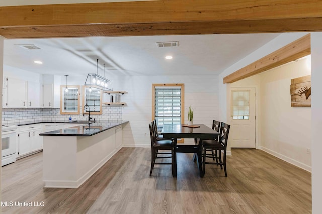 118 Dogwood Trl, Brandon, MS 39047 - dining area featuring wood finished floors, baseboards, and recessed lighting
