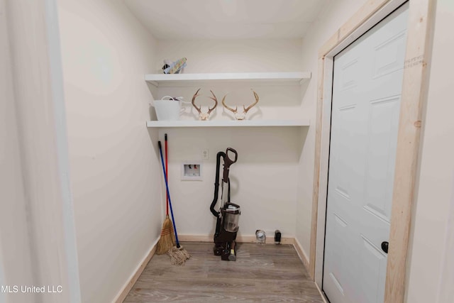 118 Dogwood Trl, Brandon, MS 39047 - laundry area featuring washer hookup, wood finished floors, and baseboards