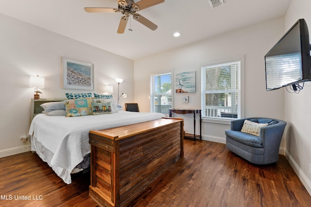 223 Sycamore St, Bay Saint Louis, MS 39520 - bedroom featuring baseboards, recessed lighting, wood finished floors, and visible vents