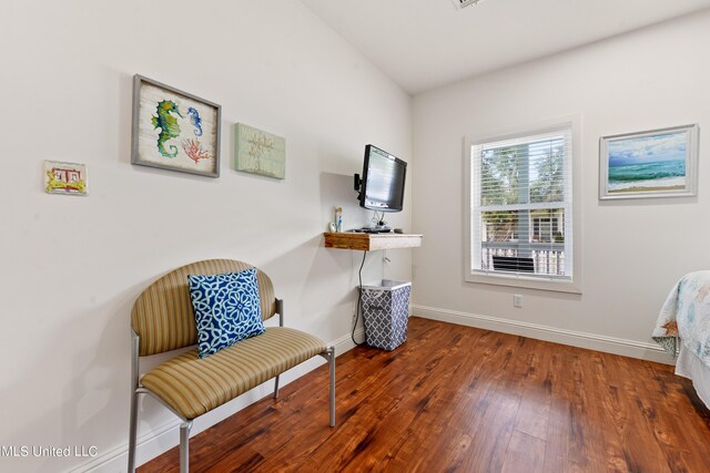 223 Sycamore St, Bay Saint Louis, MS 39520 - sitting room featuring baseboards and wood finished floors