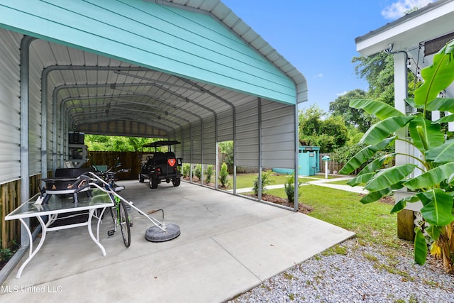 223 Sycamore St, Bay Saint Louis, MS 39520 - view of parking / parking lot featuring gravel driveway and a carport