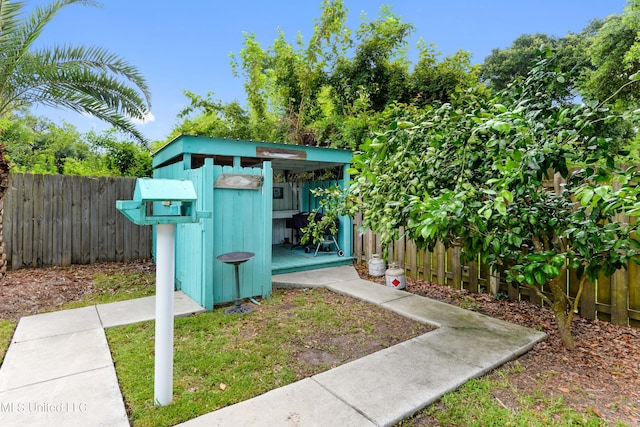223 Sycamore St, Bay Saint Louis, MS 39520 - view of outdoor structure featuring an outdoor structure and a fenced backyard