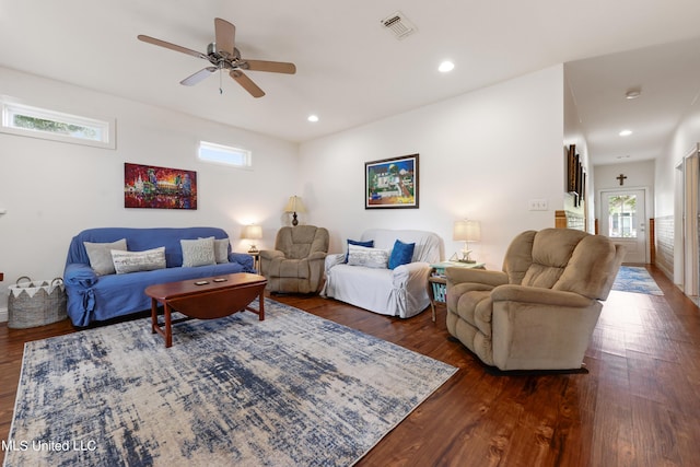 223 Sycamore St, Bay Saint Louis, MS 39520 - living area with visible vents, a healthy amount of sunlight, and dark wood-style floors