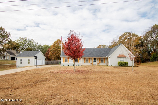 single story home with a garage and an outdoor structure