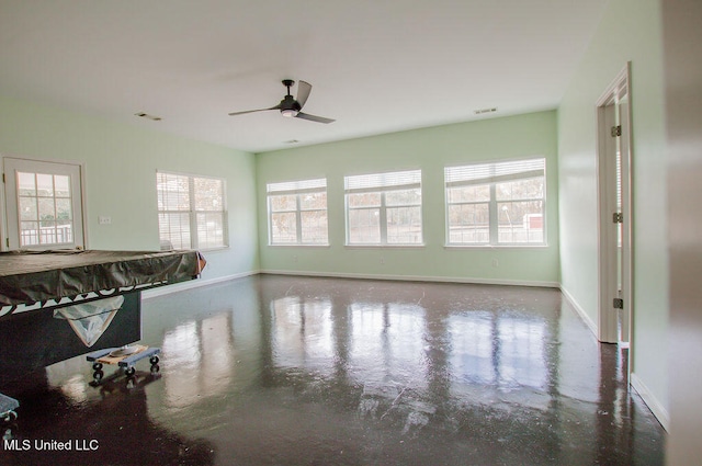 playroom with concrete flooring, ceiling fan, and billiards