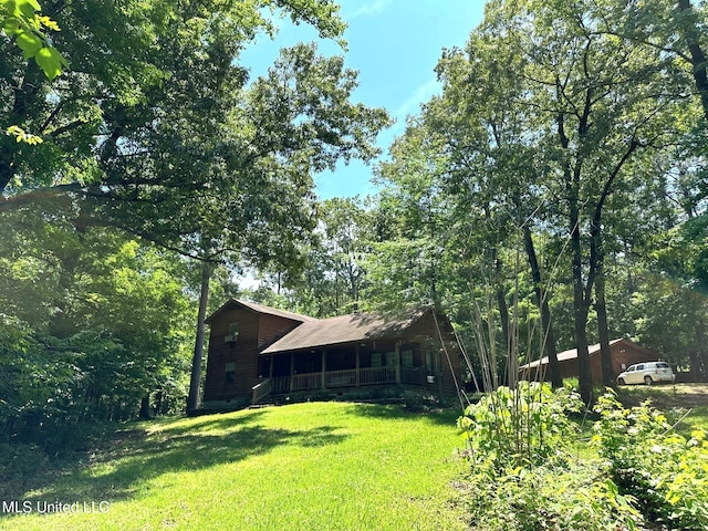 view of yard featuring a porch