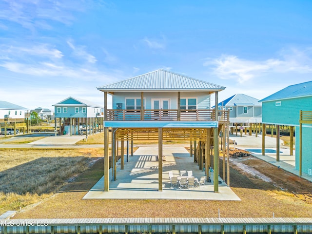 view of jungle gym featuring a patio area