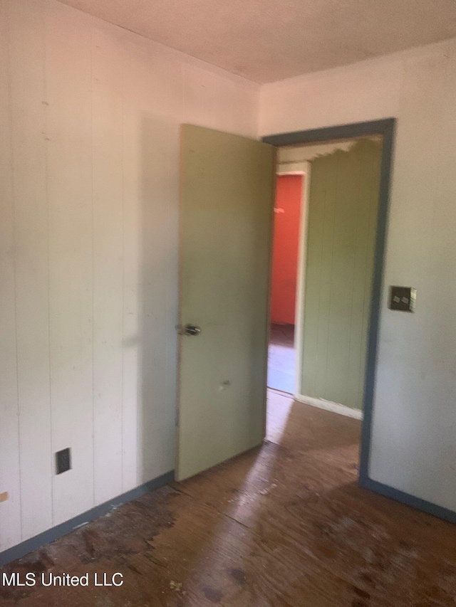 1356 Old River Rd, Harrisville, MS 39082 - spare room featuring wood finished floors