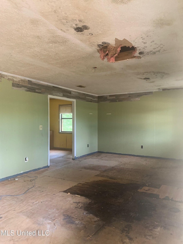 1356 Old River Rd, Harrisville, MS 39082 - spare room with a textured ceiling and baseboards