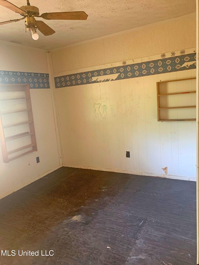 1356 Old River Rd, Harrisville, MS 39082 - unfurnished room featuring ceiling fan and a textured ceiling