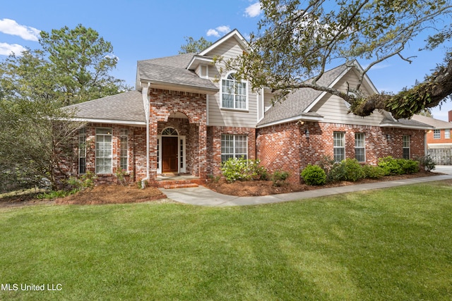 259 Holcomb Blvd, Ocean Springs, MS 39564 - front of property with a front yard