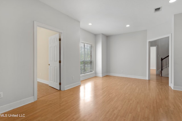 empty room featuring light hardwood / wood-style floors