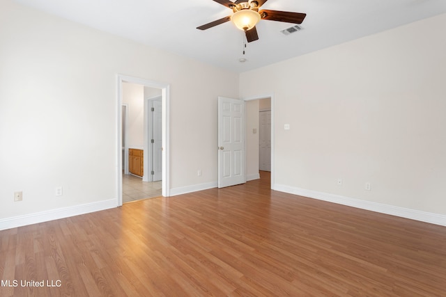 unfurnished room with light hardwood / wood-style flooring and ceiling fan