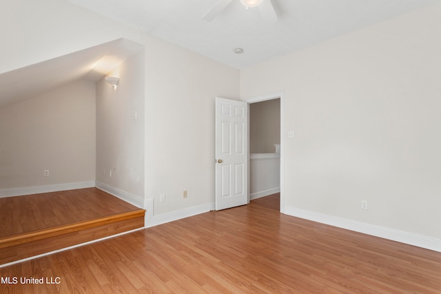 additional living space featuring light hardwood / wood-style flooring and ceiling fan