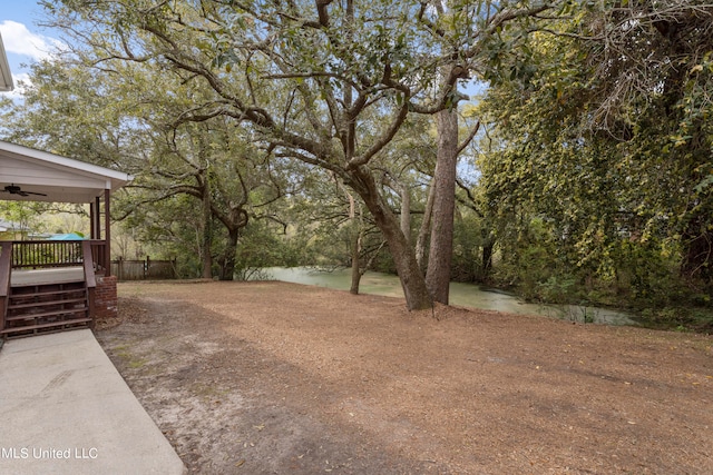 view of yard with a water view