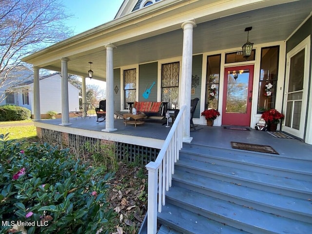 doorway to property with a porch