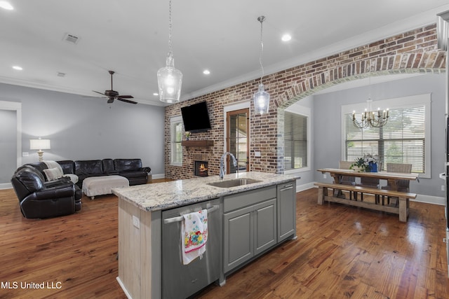 213 Wellington Way, Brandon, MS 39047 - kitchen with dishwasher, gray cabinets, a sink, a brick fireplace, and crown molding