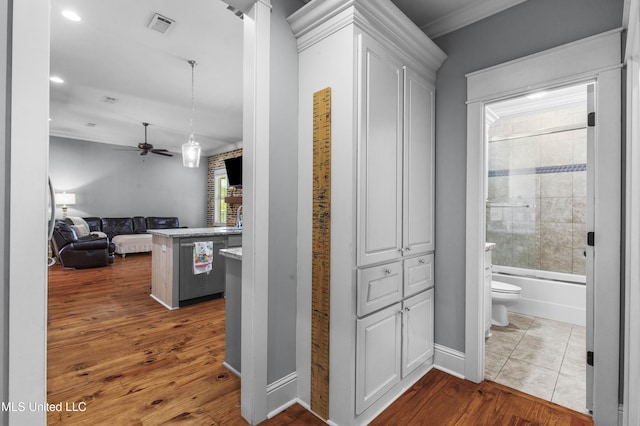 213 Wellington Way, Brandon, MS 39047 - hallway with dark wood-type flooring, crown molding, and baseboards
