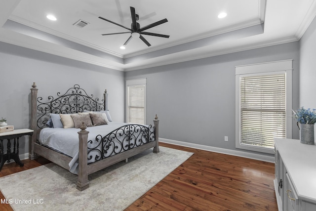 213 Wellington Way, Brandon, MS 39047 - bedroom featuring a raised ceiling, crown molding, dark wood-style floors, baseboards, and recessed lighting