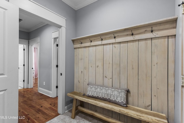 213 Wellington Way, Brandon, MS 39047 - mudroom featuring crown molding, baseboards, and wood finished floors