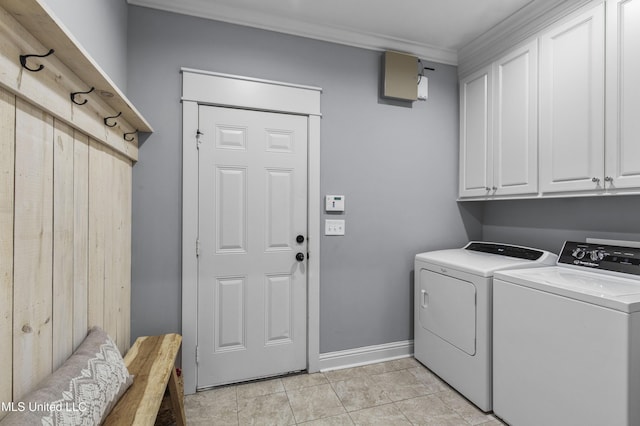 213 Wellington Way, Brandon, MS 39047 - laundry area with cabinet space, washing machine and clothes dryer, ornamental molding, baseboards, and light tile patterned floors