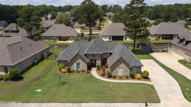 213 Wellington Way, Brandon, MS 39047 - view of front of house featuring brick siding, a shingled roof, a residential view, and driveway