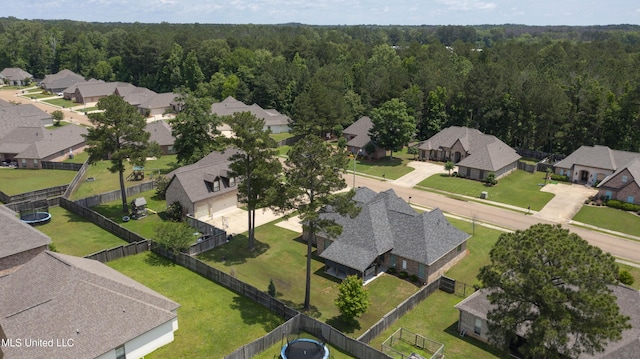 213 Wellington Way, Brandon, MS 39047 - aerial overview of property's location with nearby suburban area and a heavily wooded area
