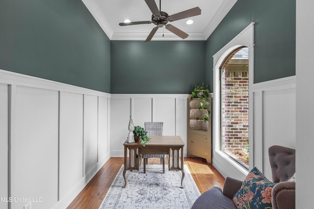 213 Wellington Way, Brandon, MS 39047 - home office with a decorative wall, ornamental molding, a wainscoted wall, ceiling fan, and wood finished floors
