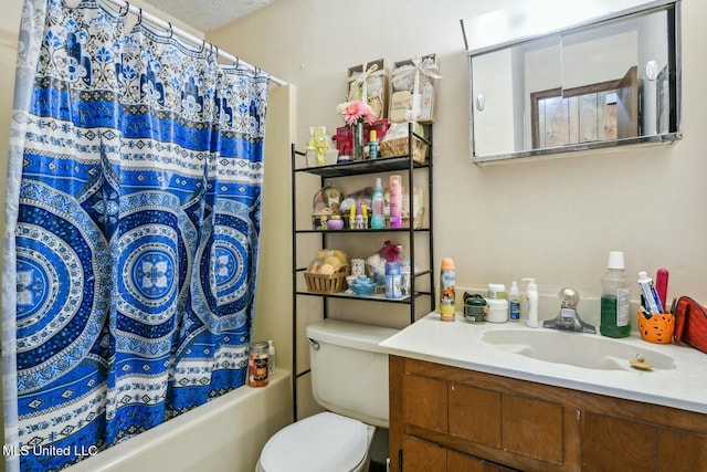 full bathroom with vanity, toilet, and shower / tub combo