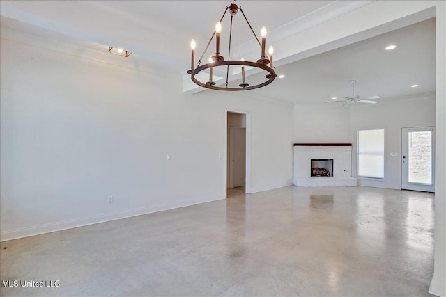 unfurnished living room featuring crown molding and ceiling fan with notable chandelier