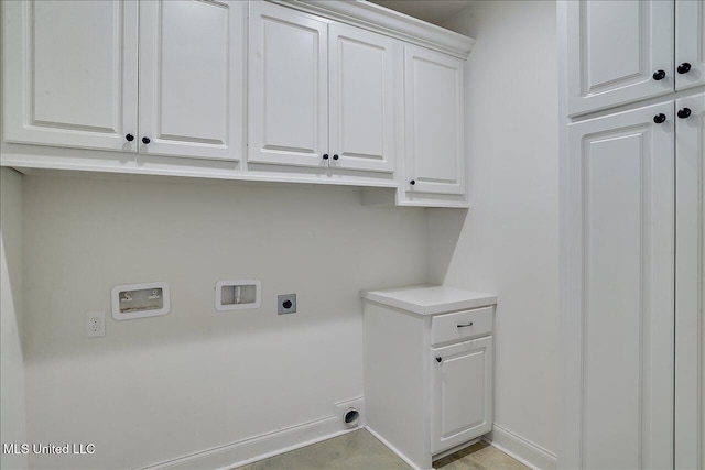 laundry area featuring washer hookup, cabinets, and hookup for an electric dryer