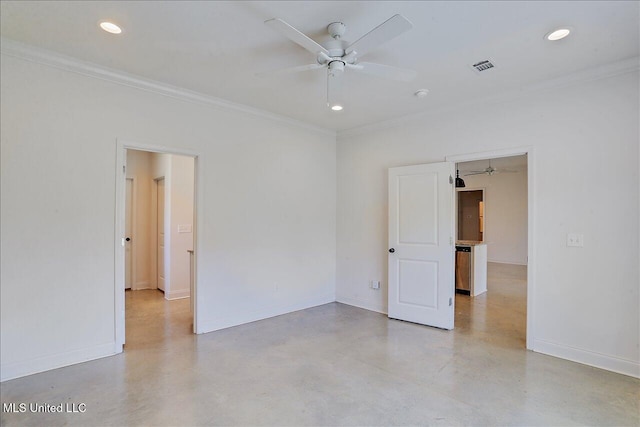 spare room with crown molding and ceiling fan