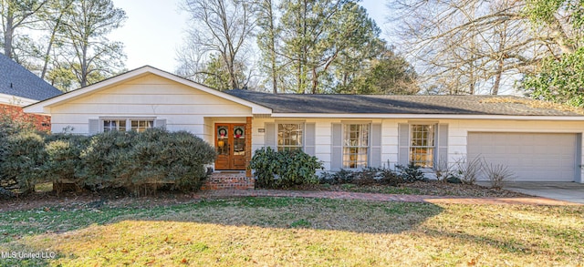 ranch-style house with a garage, french doors, a front lawn, and concrete driveway