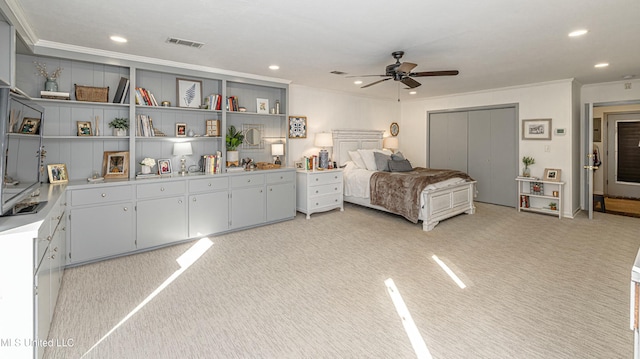 bedroom featuring ornamental molding, recessed lighting, light carpet, and visible vents