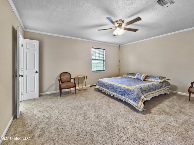 bedroom featuring carpet floors, baseboards, visible vents, and ornamental molding