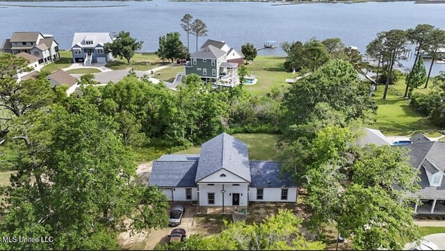 birds eye view of property featuring a water view and a residential view