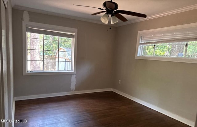 unfurnished room with dark hardwood / wood-style flooring, crown molding, and ceiling fan