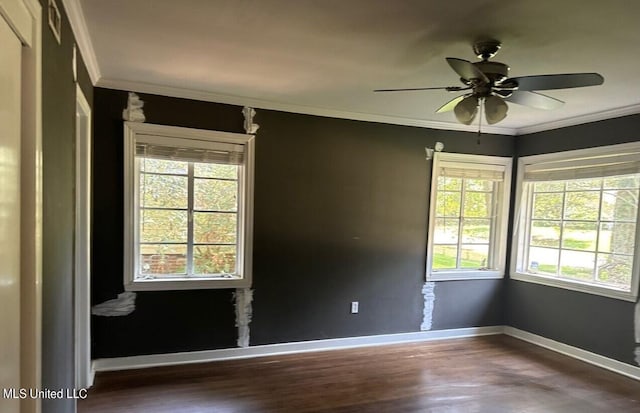 unfurnished room with crown molding, hardwood / wood-style flooring, and ceiling fan