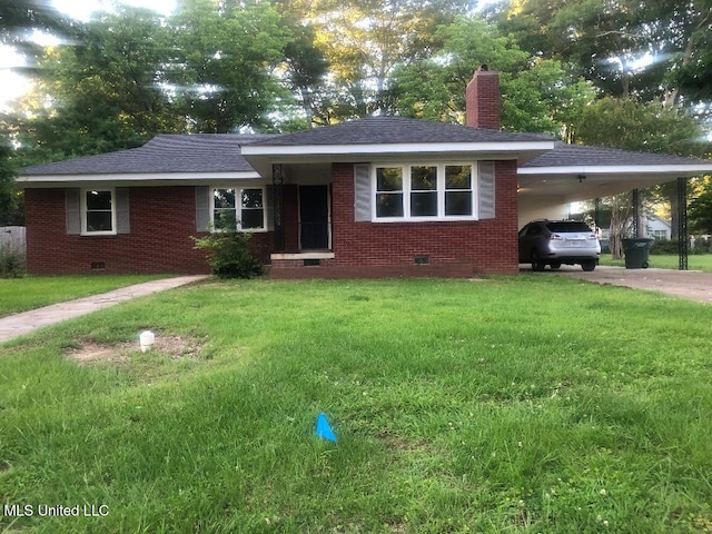 214 Evelyn St, Senatobia, MS 38668 - ranch-style house featuring crawl space, a chimney, brick siding, and a front lawn