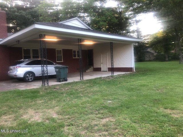 214 Evelyn St, Senatobia, MS 38668 - exterior space featuring a carport